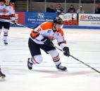 Komets center Corey Elkins skates wide on Gwinnett defenseman Justin Weller to attack for the game-winning goal with 3:59 left in the third period Jan. 2.