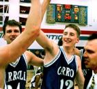 Carroll's Ryan Maifeld, Matt Ogle and coach Rob Irwin celebrate their 1999 Class 3A sectional championship after making a game-winning basket as time expired to defeat Concordia Lutheran 63-61. Ogle tipped in a missed shot for the game-winning basket that gave Carroll its first sectional title since 1985.  