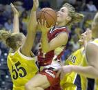 Bishop Luers senior Rachel King goes up for a shot during the 2000 Class 2A state title game against Shenandoah. King finished the season winning The News-Sentinel PrepSports Girls Basketball Player of the Year award and being a first-team All-State selection as she helped the Knights go undefeated and win their third consecutive state title. News-Sentinel file photo