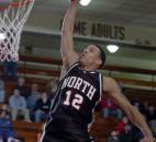 DeMarlo Belcher throws down a dunk in the second quarter of North Side's 101-68 victory against Northrop in the 2006 Class 4A sectionals. Belcher came off the bench to score 19 points in the win against North Side's Summit Athletic Conference rival. North Side would reach the sectional finals before losing to Snider. 