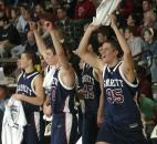 Garrett players celebrate as the final seconds tick off the clock to complete the team's 68-45 victory against Prairie Heights in the 2008 Class 2A sectional finals. Junior Tim Kidder led the Railroaders with 19 points, eight rebounds and five steals to help Garrett win its first sectional title since 2004.