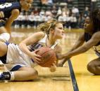 Canterbury's Aubrey Holle wrestles the ball away from University's Brittney Williams during the second half of the Cavaliers' 36-32 win in the 2008 Class A state basketball championship at then-Conseco Fieldhouse. This remains the lowest-scoring game in IHSAA state finals history. It also was the first state championship for Canterbury in program history. News-Sentinel file photo