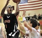 Bishop Luers' Deshaun Thomas scores against Bluffton in the 2010 Class 2A sectional. In his senior season, Thomas would be named Mr. Basketball after leading defending state champion Bishop Luers to a sectional and regional title before being upset in the semistate. 