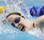 Snider's Georgia Baldus takes a breath as she swims in the fourth and fastest 200-yard freestyle heat race during the preliminaries of the girls swimming and diving state meet on Feb. 8 at the IUPUI Natatorium. (Photo by Chad Ryan/INMedia Source)