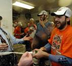Colin Chaulk, right, sprays champagne in the Komets locker room after winning the 2008 Turner Cup. (News-Sentinel file photo)