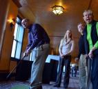 Although Todd Preston is watching the fate of his shot Feb. 7 during the Groundhog Open, his teammates Brady Hayes, Dave Whisler and Cynthia Wilkin react as if they have more at stake. (Photo by Bob Caylor of The News-Sentinel)