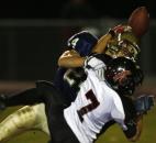 Tyler Eifert breaks up a pass intended for Zach Casper as Bishop Dwenger defeated DeKalb 52-20 for a 2007 Class 4A sectional championship. Eifert played on both offense and defense while in high school and earned honorable mention all-state honors during his junior season. In addition, the Saints ended the 2007 season advancing to the state tournament semistate. (News-Sentinel file photo)