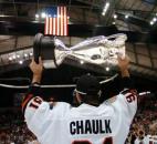 Colin Chaulk carries the Ray Miron Presidents' Cup after beating Wichita in Game 5 of the CHL finals in May 2012 at the Memorial Coliseum. (Photo by Chad Ryan/INMedia Source)