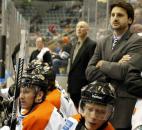 As a player/assistant coach, Colin Chaulk, right, coaches from behind the Komets' bench Jan. 6 at Memorial Coliseum. was been sidelined by an infection on his foot. (Photo by Chad Ryan/INMedia Source)