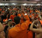 Northrop coach Barak Coolman, center, gets the "Coolman Crazies" clapping before the start of the Bruins' game against Concordia Lutheran on Feb. 1 at Northrop. (Photo by Chad Ryan/INMedia Source)