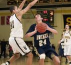 Reggie Hearn defends Tyler Eifert in the final 10 seconds of Snider's 47-45 win against Bishop Dwenger during the 2007-08 regular season. Eifert played three seasons on the Dwenger boys basketball team. (News-Sentinel file photo)