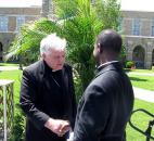 Bishop John D'Arcy greets a supporter after a protest in May 2009 at the University of Notre Dame against abortion and President Obama's appearance. News-Sentinel file photo