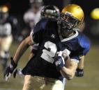 Bishop Dwenger senior Tyler Eifert returns a kickoff for a touchdown during the Saints' victory against Lowell in the 2008 Class 4A semistate. Eifert ended his high school career being named The News-Sentinel PrepSports Football Player of the Year. (News-Sentinel file photo)