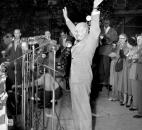 Gen. Dwight D. Eisenhower and his wife, Mamie, arrived on their special train for a campaign stop in Fort Wayne on Sept. 15, 1952. Their visit was part of a whistle-stop swing of 12 Midwestern states. Rep. E. Ross Adair introduced the Republican candidate for president, who spoke to a crowd of 5,000 at Pennsylvania Railroad Station. (Photo by The News-Sentinel)