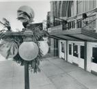 Christmas decorations still hang on two lamp poles outside the Baker Street Station on March, 11, 1987. (Photo by The News-Sentinel)