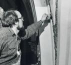 Craig Leonard works to repair walls in the Baker Street Station on Nov. 25, 1986. (Photo by The News-Sentinel)