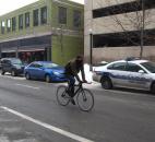 Jimmy John's employee Nate Richman heads back to the downtown location to pick up another order to deliver by bike. (Photo by Jaclyn Goldsborough of The News-Sentinel)