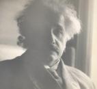 Albert Einstein sits inside a train car parked outside the Baker Street Station on March 4, 1931. Einstein stopped in Fort Wayne, but did not leave the train car. He was on a tour a United State tour en route to New York on the Manhattan Limited. (Photo courtesy of The Allen County Library)