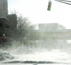 A strong wind whipped snow Monday in downtown Fort Wayne. (Photo by Ellie Bogue of The News-Sentinel).