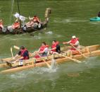 The SS Hope She Makes It! floats down the St. Marys River Saturday at Fort Wayne Newspapers Three Rivers Festival Raft Race. Photo by Matthew Glowicki of The News-Sentinel