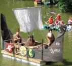 A Viking-style raft makes it way down the St. Marys River Saturday afternoon as part of the Fort Wayne Newspapers Three Rivers Festival Raft Race. Photo by Matthew Glowicki of The News-Sentinel