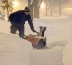 Jim Miklos digs out early Wednesday morning from his home in the 4600 block of Beaver Ave( Photo by Ellie Bogue of The News-Sentinel).