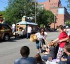 Texas Roadhouse employees were handing out promotional items and goodies to children watching the Lutheran Health Network Three Rivers Festival Parade Saturday, July 13. (Photo by Jaclyn Goldsborough)