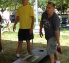 Troy and Steve Panning throw cornhole bags in Fort Wayne Newspaper's Cornhole Classic at the Three Rivers Festival. (Photo by Jaclyn Goldsborough)
