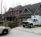 An FBI truck sits outside a home in the 6600 block of Cherry Hill Parkway, where federal agents were executing a search warrant Thursday morning. The house belongs to Michael Fabini, brother of Fort Wayne native and former NFL player Jason Fabini. Photo by Christian Sheckler