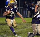 New Haven running back Anthony Moore looks for an opening Friday night against East Noble. (By Blake Sebring of The News-Sentinel)
