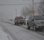 As visibility diminished, cars began slowing along Bluffton Road in Waynedale around 4:30 p.m. Monday. A band of heavy snow began sweeping across Fort Wayne shortly after 4 p.m. Monday, Feb. 17. (By Bob Caylor of The News-Sentinel)