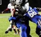 Bishop Luers Jaylan Smith takes to the air as he scores a touchdown during regional football action Friday evening at Tipton. Photo by Rob Edwards