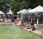 People try to keep cool amid the humid weather Sunday afternoon at Art in the Park in Freimann Square. (Photo taken 7-14-13)