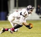 Garrett receiver Drake Landes makes a shoestring grab in the Railroaders' game on Friday at Heritage. Photo by Chad Ryan