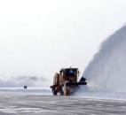 The crew who, started their shift at 3 a.m., were using three snowplows, three brushes and two blowers to keep the runways clear at Fort Wayne International Airport.(Photo by Ellie Bogue of The News-Sentinel).