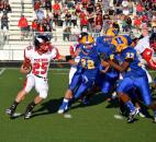 Huntington North running back Braydin Stell looks to turn the corner against Homestead’s defense in the second quarter Friday night. (By Blake Sebring of The News-Sentinel)