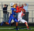 Huntington North receiver Caleb Richison makes an amazing catch of a bomb from quarterback Drew Schnitz during the first quarter Friday night against Homestead. (By Blake Sebring of The News-Sentinel)