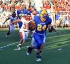 Homestead running back Kyle Mohsenzadeh breaks outside against Huntington North in the second quarter Friday night. (By Blake Sebring of The News-Sentinel)