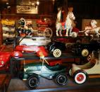 A visit to toy car land. Replicas of horse carts, fire trucks, police cars and autos are housed together..