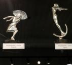 1920s hood ornaments from France, left, and Spain