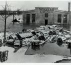 Entrances to the Wayne Oil Tank & Pump Co. were submerged in floodwaters of the Maumee River. (News-Sentinel file photo)