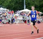 Jonathan Harper of Carroll starts to show excitement as he closes in on the last 50 meters of the 4x800-meter relay. Carroll won with a time of 7:40.14. (Photo by Gannon Burgett for The News-Sentinel)