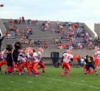 Northrop’s Pedro Hernandez, right, follows through on a successful extra-point conversion against Snider on Friday, Aug. 31, 2012. The Bruins lost the game however, 48-14. (Photo by Don Converset of The News-Sentinel)