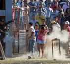 Inmates relatives clash with police outside a prison after a deadly fire in Comayagua, Honduras. More than 350 inmates perished in the February fire that swept through the prison. More than half the inmates were still awaiting trial.  Many of those who died had been locked up for petty crimes: stealing a wallet, robbing a truck. Some had never been charged. Photo by The Associated Press