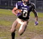 New Haven senior Isaiah Lee looks for running room Friday night against East Noble. Photo by Blake Sebring