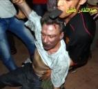 In this image from video, the body of U.S. Ambassador Chris Stevens is moved by Libyan civilians trying to rescue him after gunmen and protesters rampaged through the U.S. consulate in Benghazi, Libya, on Sept. 11. Three other Americans were also killed in the attacks, which sparked controversy and a congressional investigation. Photo by The Associated Press
