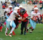 Bishop Luers linebacker Aaron LaMaster tackles Wayne’s Jaylon Thomas with help from behind by the Knights’ Jaylon Smith. (By Blake Sebring of The News-Sentinel)