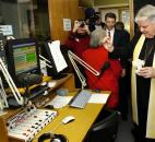 Bishop John D'Arcy blesses the broadcast studio for Redeemer Radio, the new Catholic Radio station, in January 2006. News-Sentinel file photo
