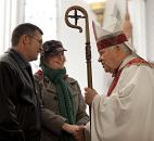 Bishop John D'Arcy greets newlywed parishioners Todd and Janice Fletcher of Fort Wayne after conducting his last Mass before retirement in January 2010 at the Cathedral of the Immaculate Conception in Fort Wayne. News-Sentinel file photo