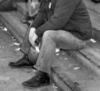 The Rev. David Gaskill, pastor of Faith United Church of Christ, had been working almost nonstop at the coliseum's sandbagging operation, where he'd been made a line foreman. By Tuesday of the flood, he'd been at it all but 10 hours. Here he catches a few minutes of rest.